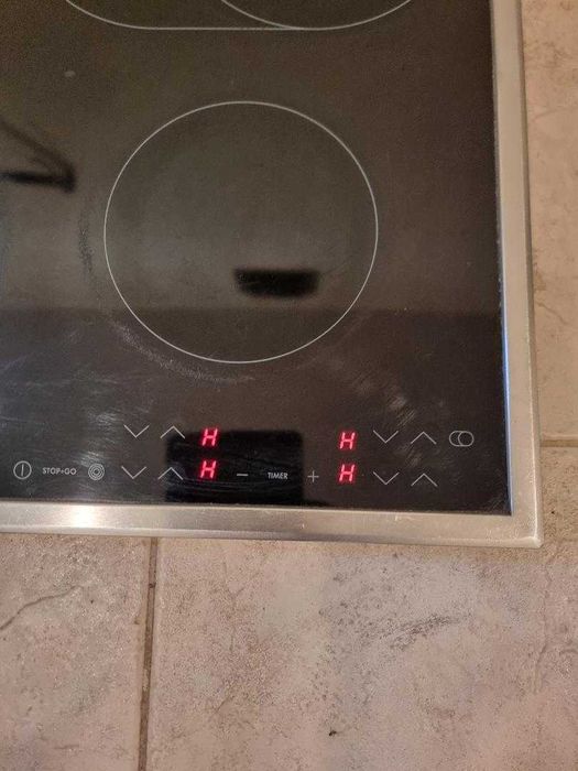 Стъклокерамичен плот .за вграждане 4 котлона с допълнителни зони