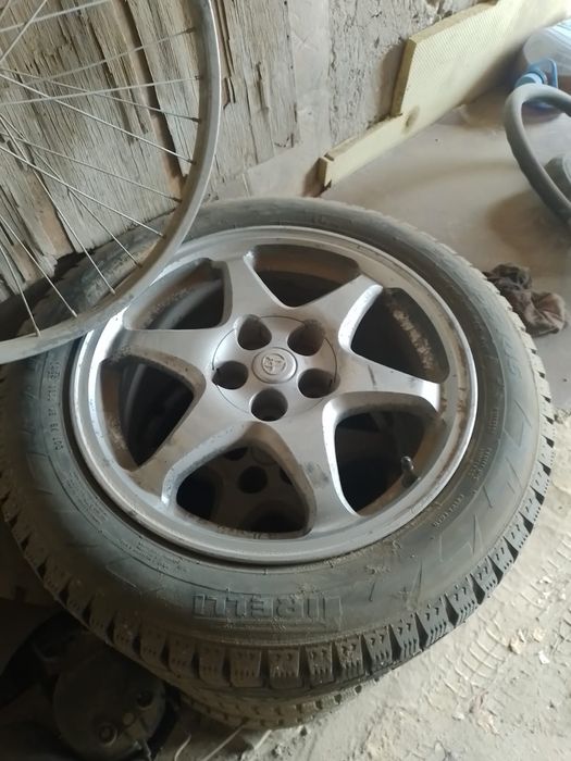 Қыстық покрышка дискісімен