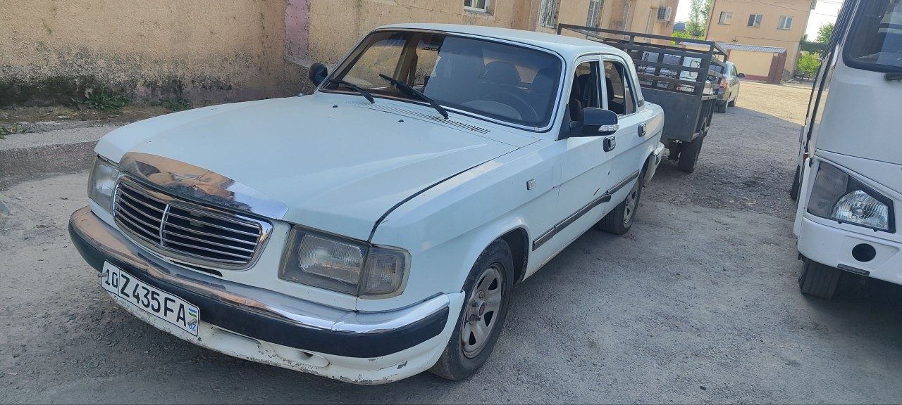 Продаю Волгу 3110 с прицепом