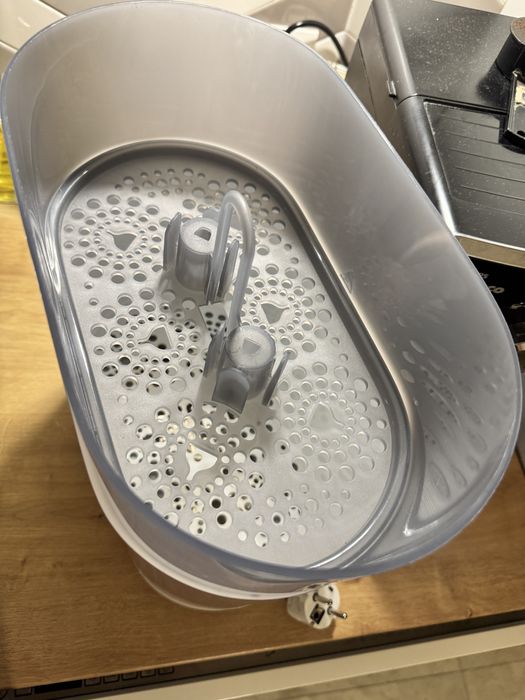 Vand sterilizator Avent 4 in 1 - ca nou , am si cutia