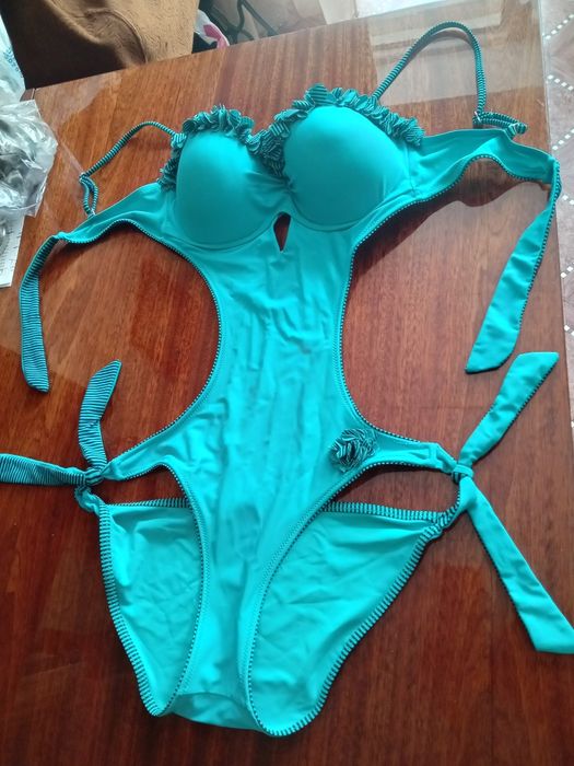 Продам женский купальник 48 размера