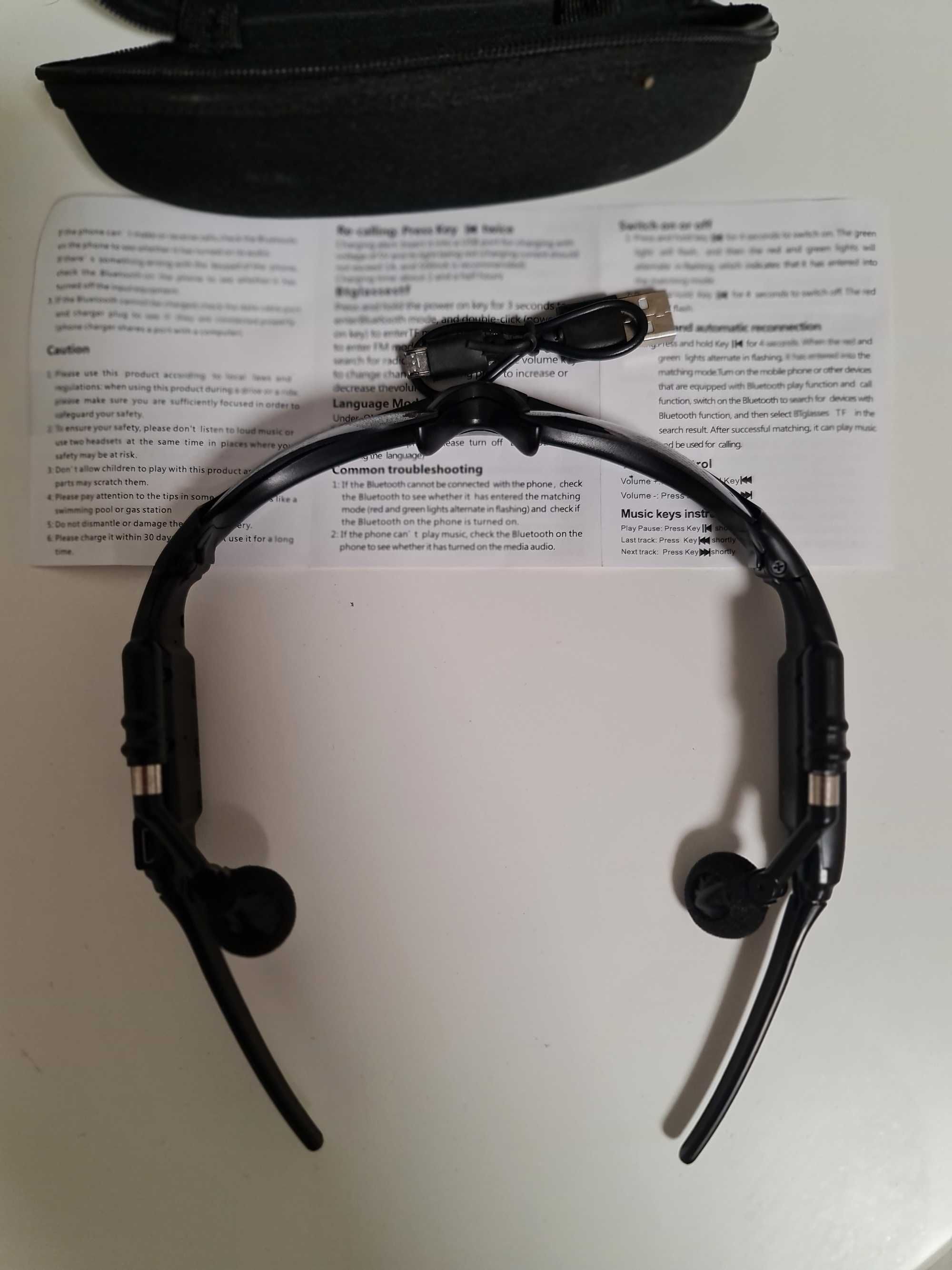Ochelari de soare cu căști audio prin Bluetooth si toc