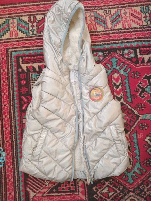 Безрукавка меховая тёплая новая