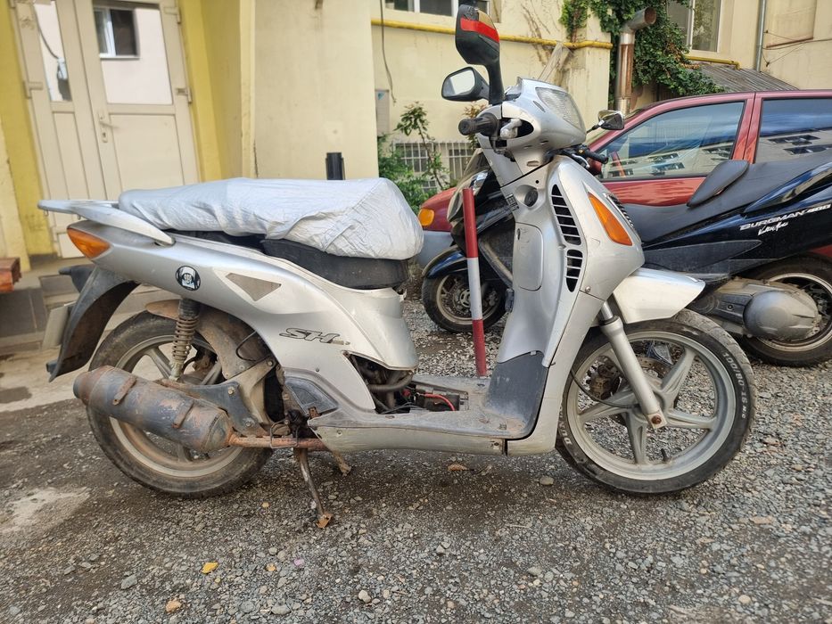 Scuter honda 150 cm3 , sau Schimb cu scuter mic de 49 sau de 50 cm3