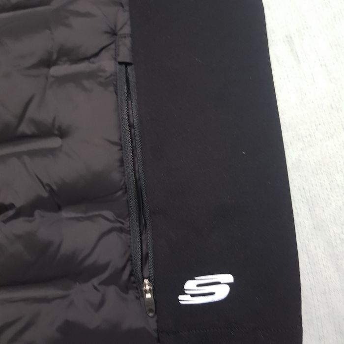 Желетка скечерс.