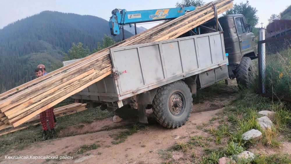 Вездеход 4х4 манипулятор газ66 с лебёдкой и цепями