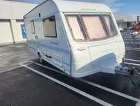 Rulota coachman pistiche 470/2 vinde schimb cu rulota 2 axe