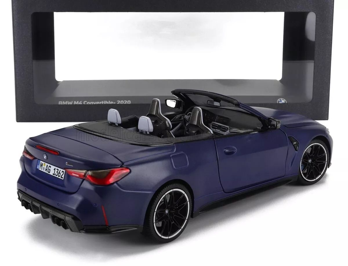 BMW M4 Cabriolet (G83) year 2021 dark blue metallic 1:18 Minichamps