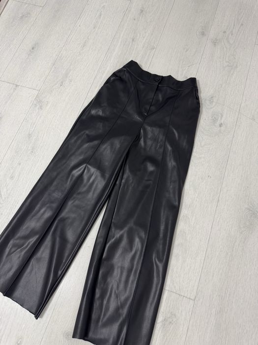 Кожаные брюки новые и свободные