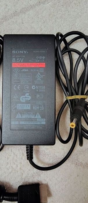 Încărcător original și accesorii PlayStation