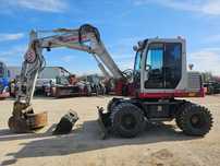 Takeuchi TB175W excavator pe roti 4 cupe  pe pneuri buldoexcavator 4 cupe / de la unic proprietar