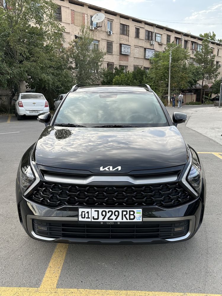 KIA Sportage premium 4 pozitsiya