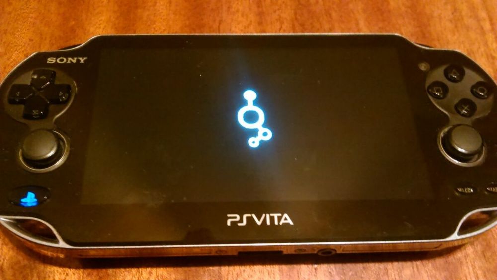 PS Vita 1004 OLED със 64 GB карта с качени 1823 игри