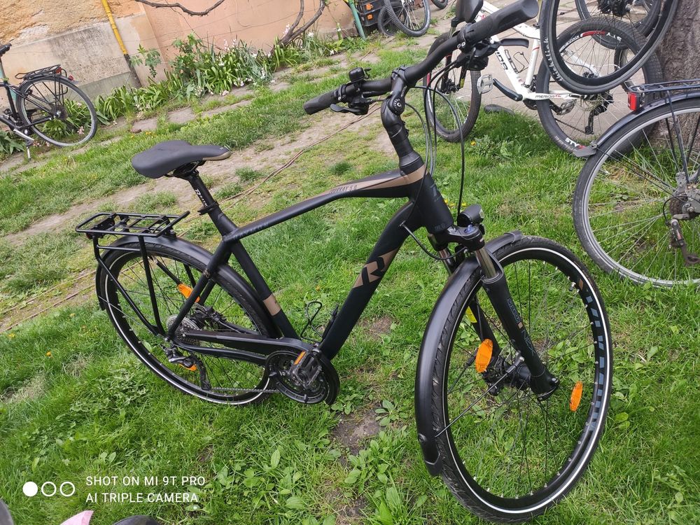 Bicicleta raymon tourray 5.0 ca nou