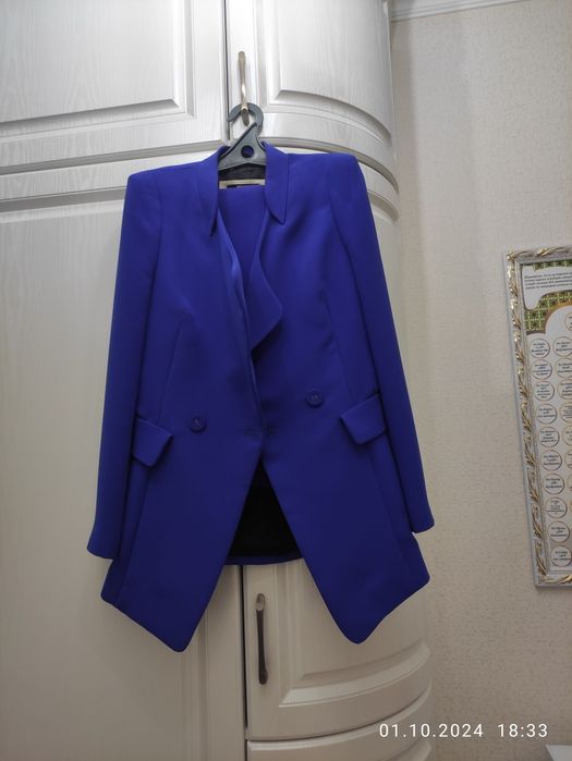 Продам брючной костюм