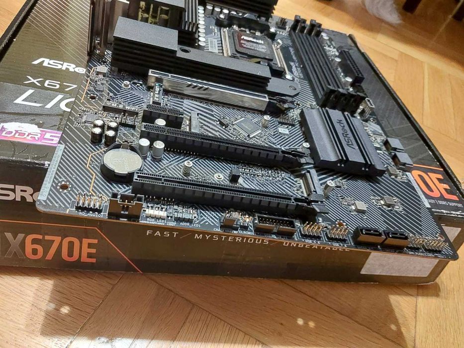 AMD Ryzen 9 7900X + AsRock X670E PG Lightning