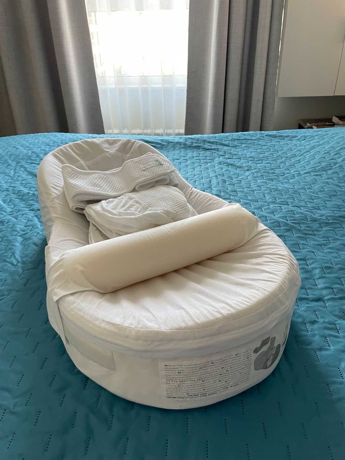 Red Castle Cocoonababy гнездо с допълнителен чаршаф и колан