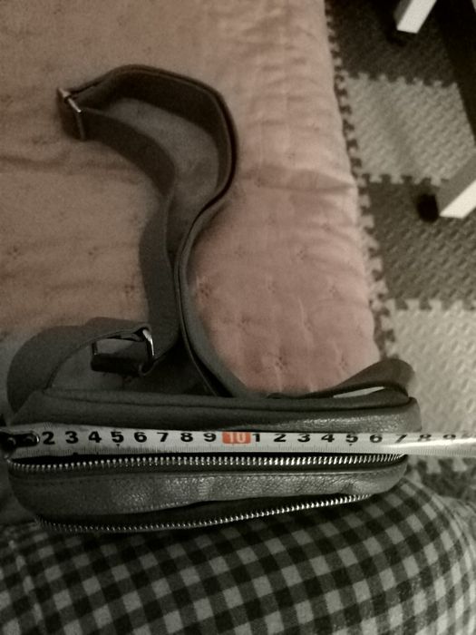 Geantă tip borsetă din piele naturala