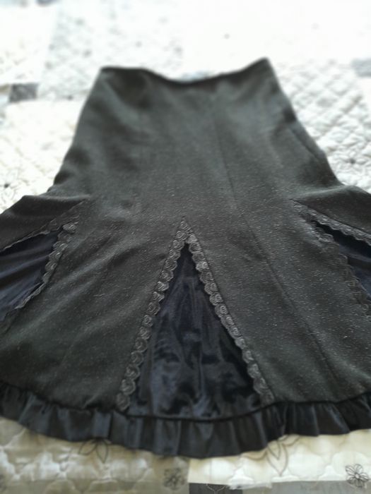 Елегантен дамски костюм.