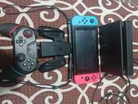nintendo switch+controler,joystick-uri,+încă un controler
