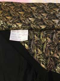 Ткань трикотаж черный с золотом для платья костюма подарка