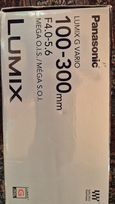 Vând  obiectiv foto Panasonic Lumix G Vario 100-300mm