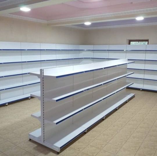 Стеллажи металлические полки витрины для магазинов