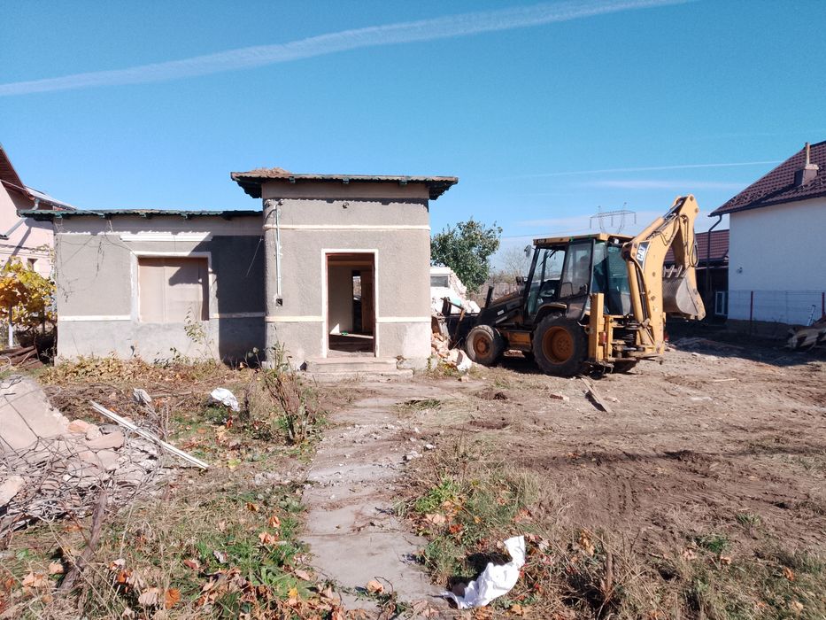 Evacuez Transport Excavator Buldoexcavator De Închiriat