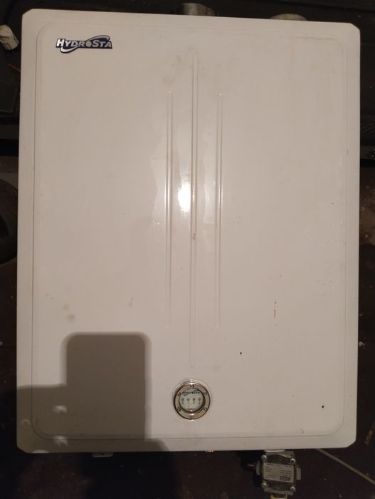 Продам газовый котел в рабочем состоянии