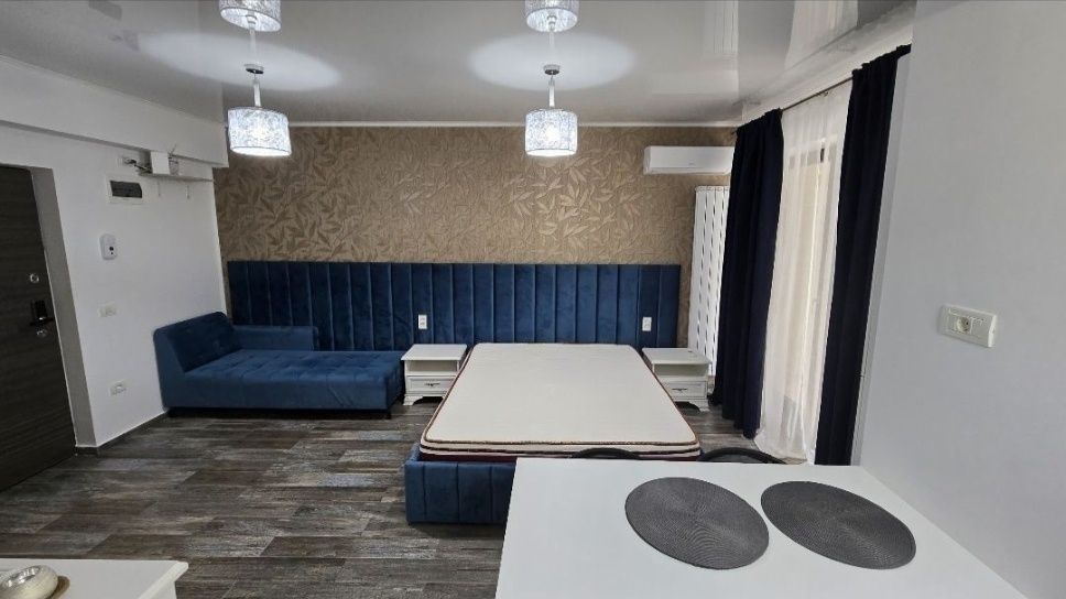 Garsonieră  Ștefan Building Resort cu curte proprie