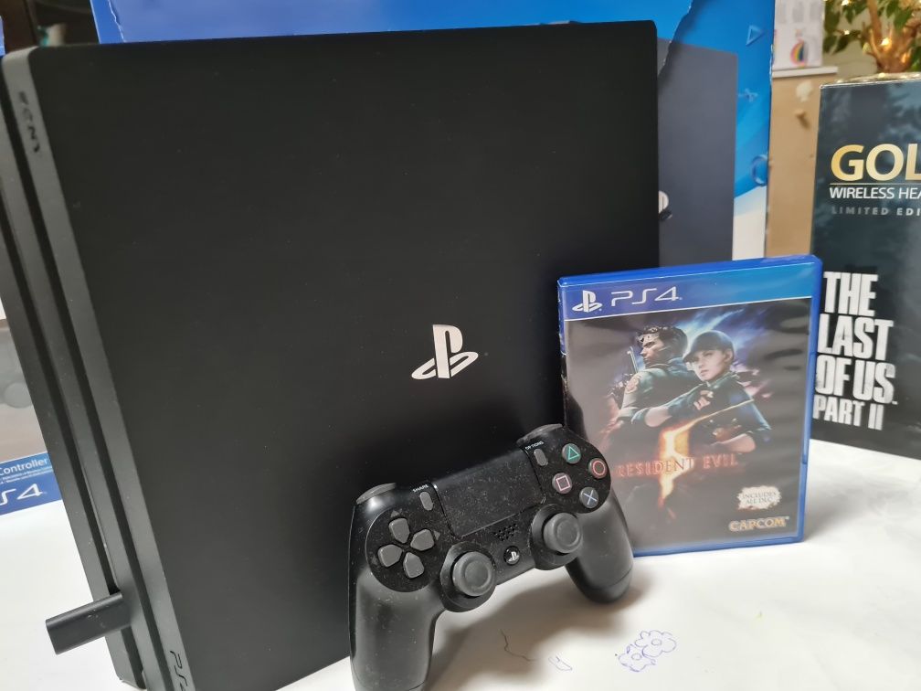 PS 4 Pro with accessories and games