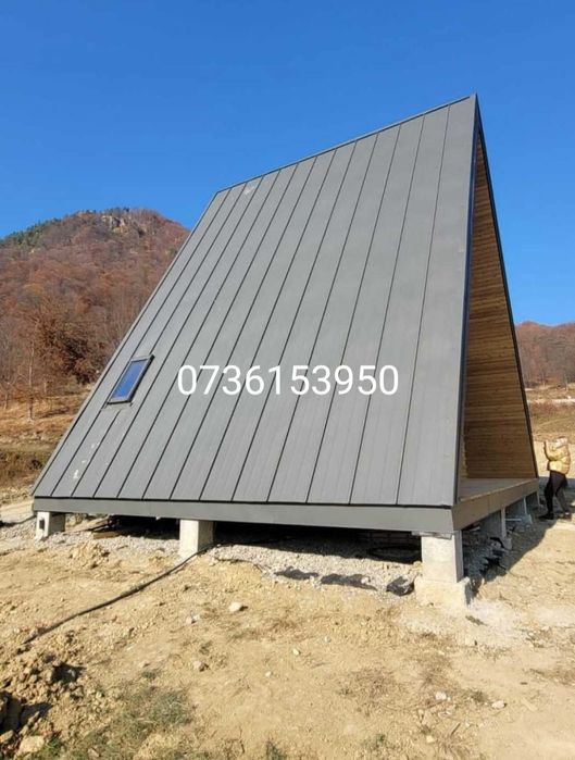 Case din lemn la cheie