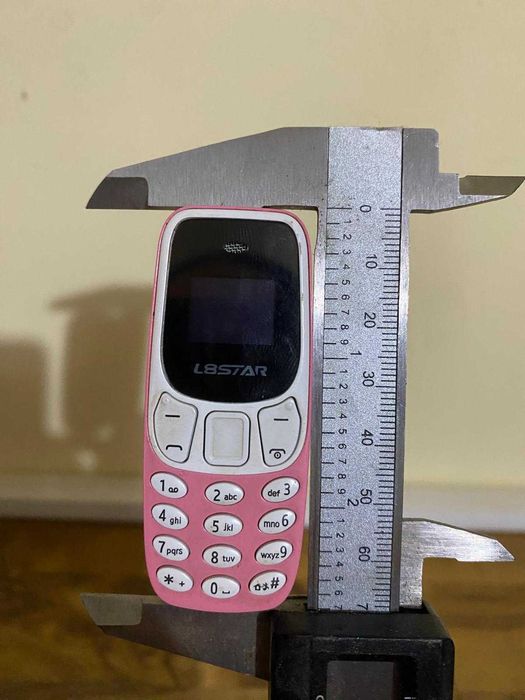 Мини детски телефон – розов, работещ, със SIM – идеален за деца