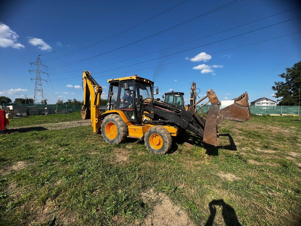 Vând Buldoexcavator CAT 428 C 2001