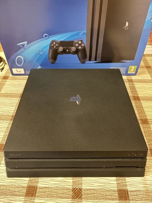 PlayStation 4 Pro 1TB - с подарък 6 игри