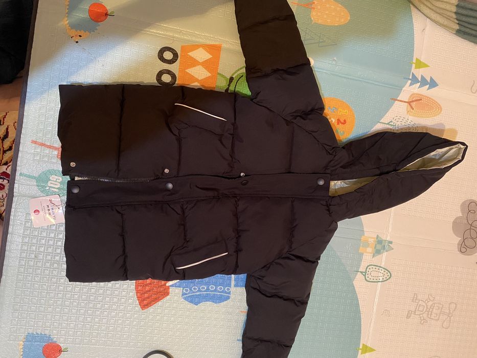 Новая куртка с этикеткой