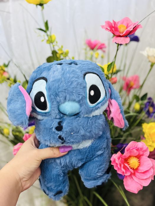 Ursulet plus stitch canta si respira