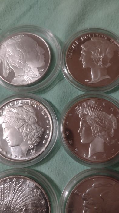 Lot 6  bucati (uncii )argint dolari U.S.A