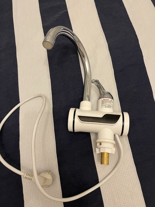 Продаю проточный кран водонагреватель