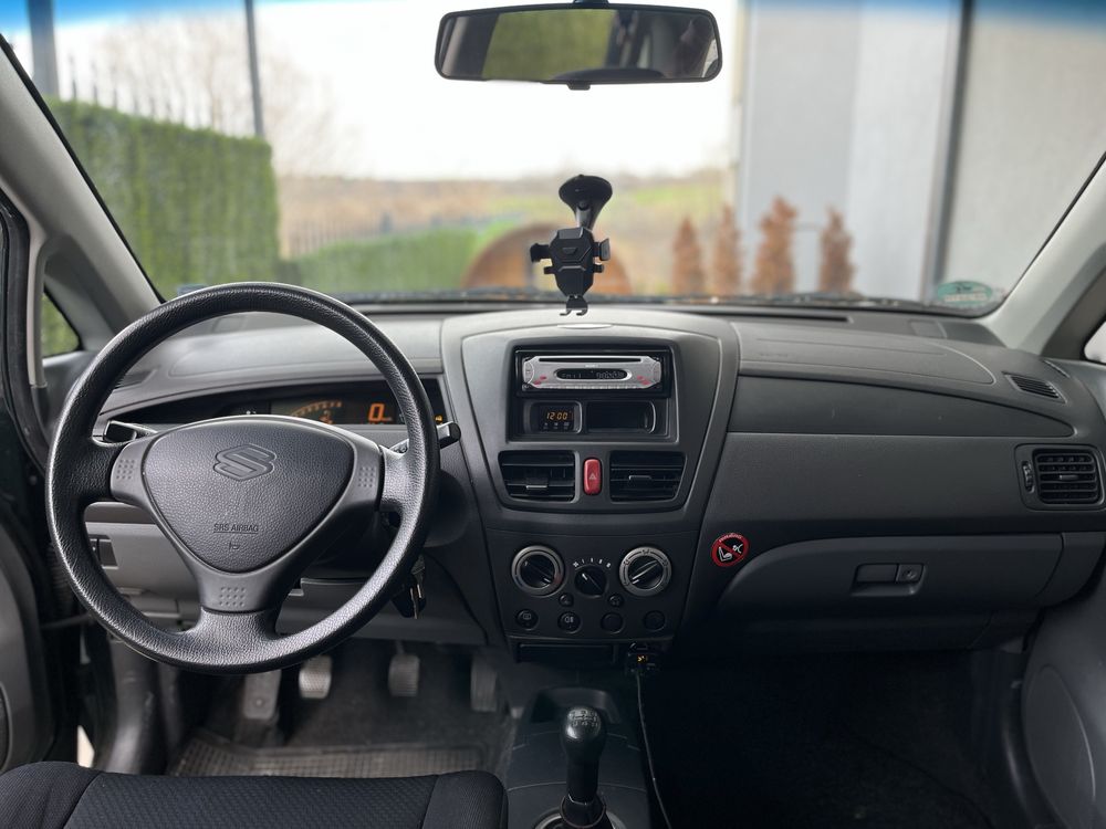 Suzuki Liana 2003  1.3    116’000 км