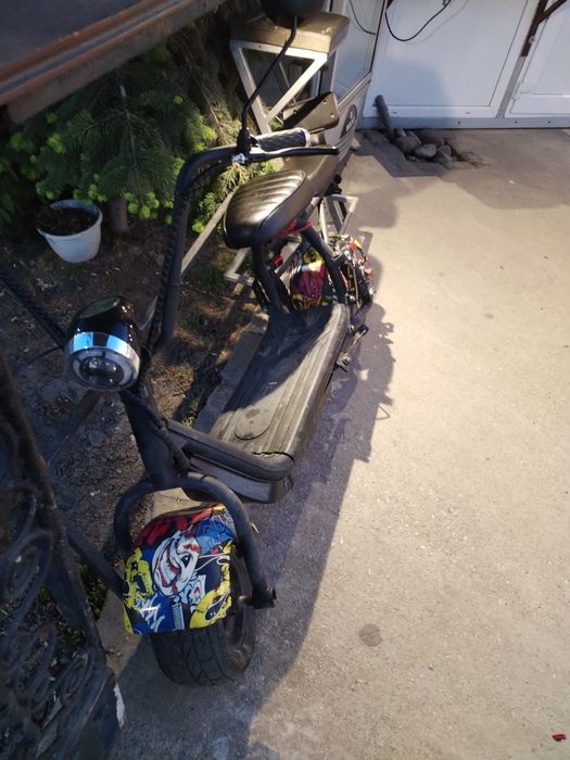 Vând motocicleta electrica pret 2000de lei folosita 3 luni