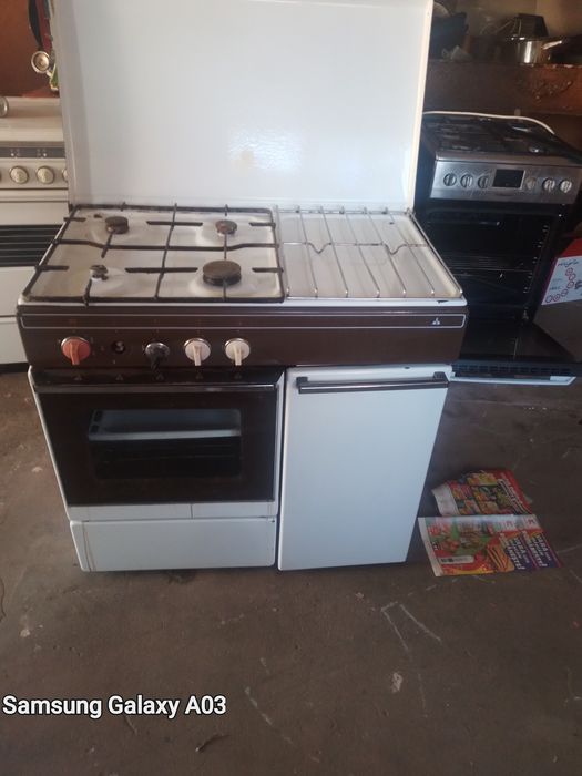 Masina de cusut ver  aragaznr 4 ochiuri si loc de buteliesat mai multe