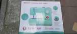 Masina de cusut Singer SIMPLE 3223 Green, 23 de programe, alb/albastru