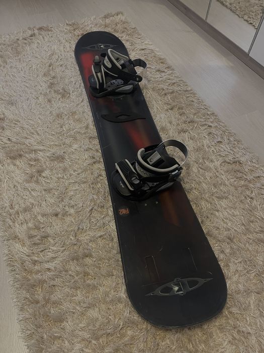 Snowboard k2 FTWO + legaturi Atomic