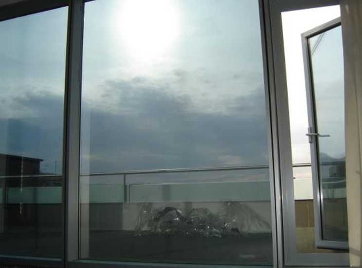 Folie protectie SOLARA (cu efect tip oglinda) pentru geamuri cladiri!