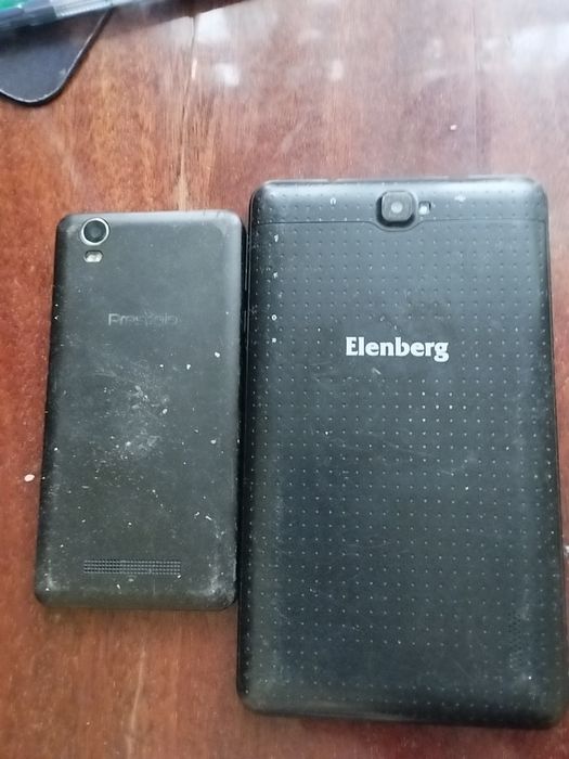 Продам сломанный телефон Prestigio и планшет Elenberg