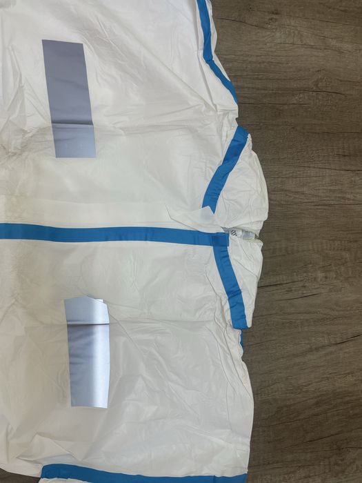 Продам новые одноразовые комбинезоны