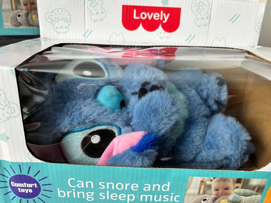 Jucarie de Plus Stitch, Vidra 30cm, cu Muzica si Imitatie Respiratie