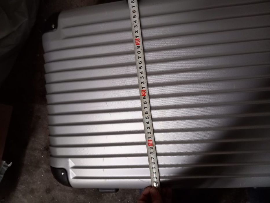 Troler cu roți singurul defect e puțin îndoit la cap