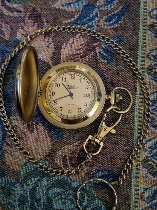 Карманные механические часы.
